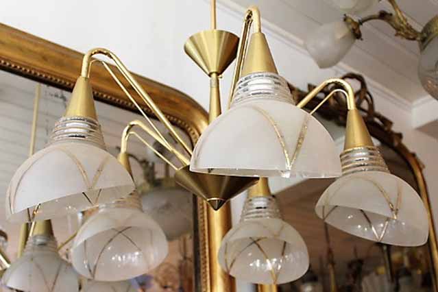 Goudkleurige vintage hanglamp. met 5 lampenkappen
